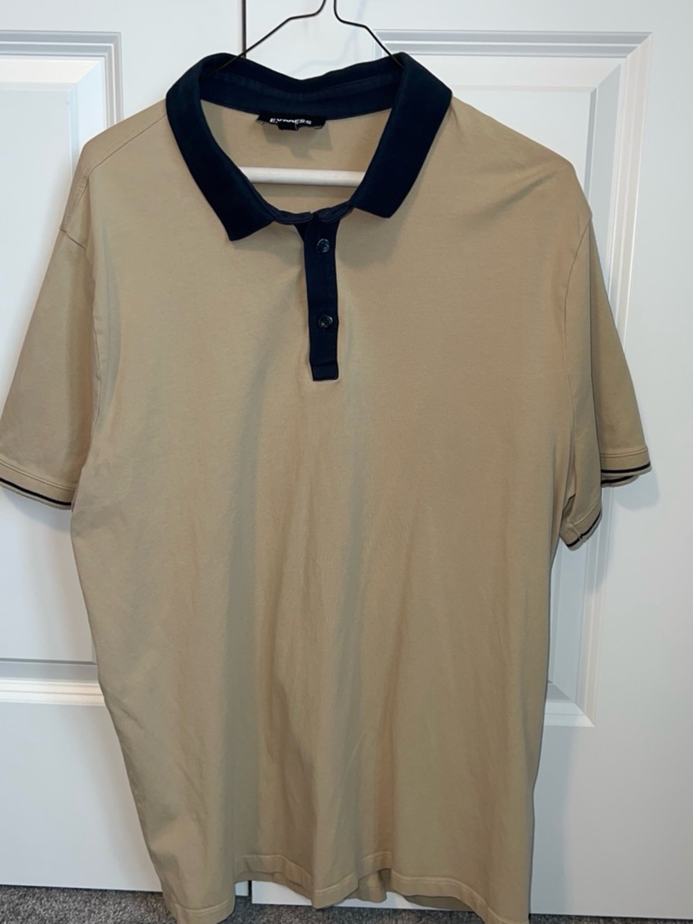Express Beige Polo with Black Collar and Trim